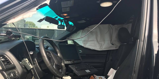 The officer inside the police vehicle suffered minor injuries.