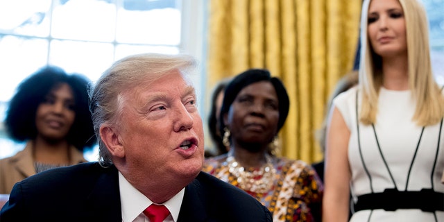 President Donald Trump, accompanied by Ivanka Trump, speaks before signing the National Security Presidential Memorandum to Launch the "Women's Global Development and Prosperity" Initiative