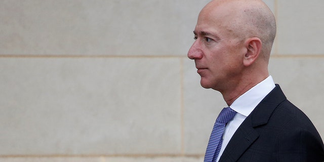 Amazon founder Jeff Bezos' private investigation into leaked text messages leads top security consultant to question mistress' brother, reports say. .REUTERS/Joshua Roberts