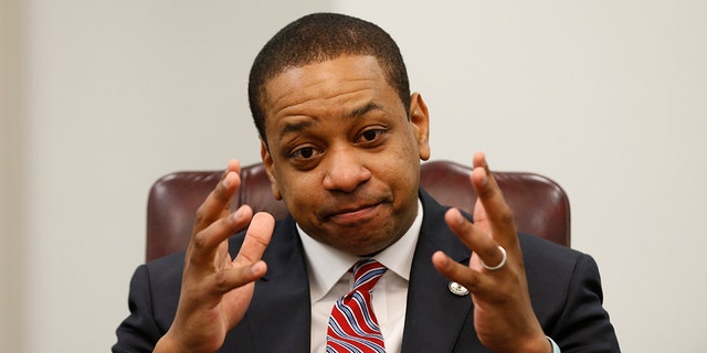 Virginia Lt. Gov. Justin Fairfax speaks during an interview in his office at the Capitol in Richmond, Va., on Saturday, Feb. 2, 2019. Fairfax answered questions about the controversial photo in Gov. Ralph Northam's yearbook page. (AP Photo/Steve Helber)