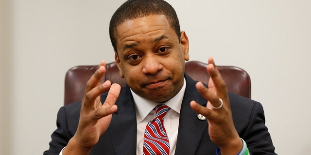 Virginia Lt. Gov. Justin Fairfax speaks during an interview in his office at the Capitol in Richmond, Va., on Saturday, Feb. 2, 2019. Fairfax answered questions about the controversial photo in Gov. Ralph Northam's yearbook page. (AP Photo/Steve Helber)