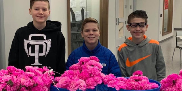 A group of young boys in Kansas reportedly had a Valentine’s Day surprise for each female at their middle school on Thursday.