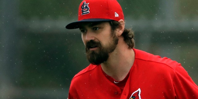 St. Louis Cardinals pitcher Andrew Miller stretches during spring training baseball practice Wednesday, Feb. 13, 2019, in Jupiter, Fla.