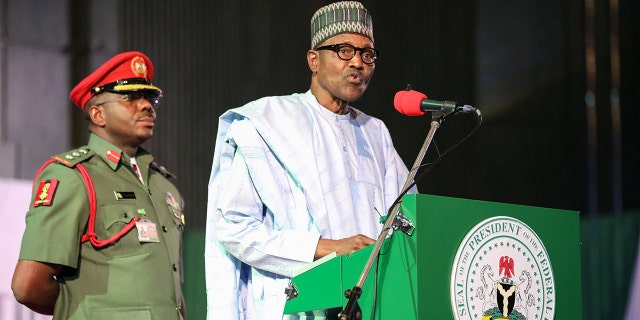 Nigerian President Muhammadu Buhari addresses the audience following his re-election, after Nigeria's Independent National Electoral Commission presented his certificate of election on February 27, 2019, in Abuja. (KOLA SULAIMON/AFP/Getty Images)