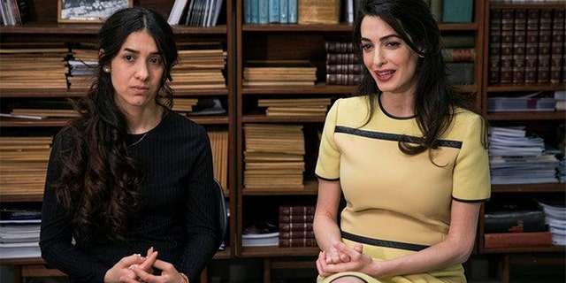 Yazidi survivor Nadia Murad (L) takes part in an interview with international human rights lawyer Amal Clooney at United Nations headquarters in New York, U.S., March 9, 2017.