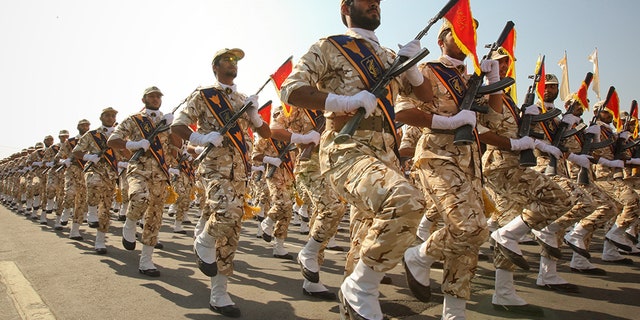 Members of the Iranian Revolutionary Guard march during a parade in Tehran, Iran.