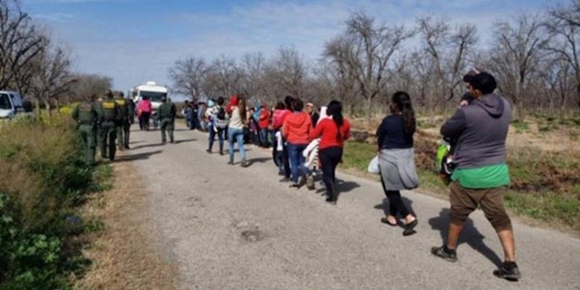 A group of 90 Honduran nationals - mostly families and unaccompanied minors - were apprehended after crossing the Rio Grande River in Texas.