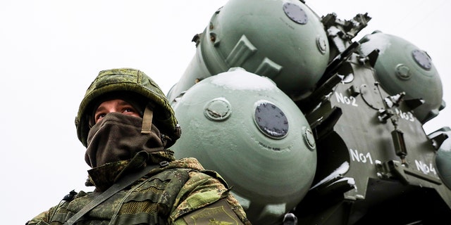 A military crew of the S-400 Triumf missile system waiting as a military anti-aircraft unit of the Russian Air Force and the southern military district of the Russia enters combat mission near the city of Dzhankoy, Crimea. 