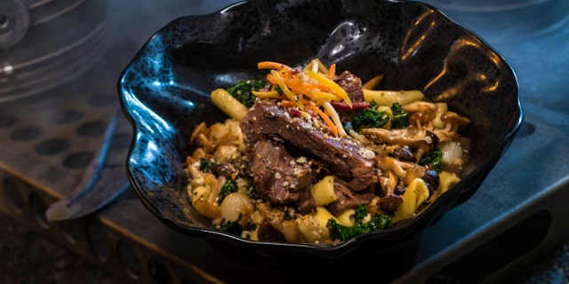 The roast of braised shaak, found at Docking Bay 7 The food and cargo inside Star Wars: Galaxy's Edge, includes roast beef with cavatelli pasta, kale and mushrooms.