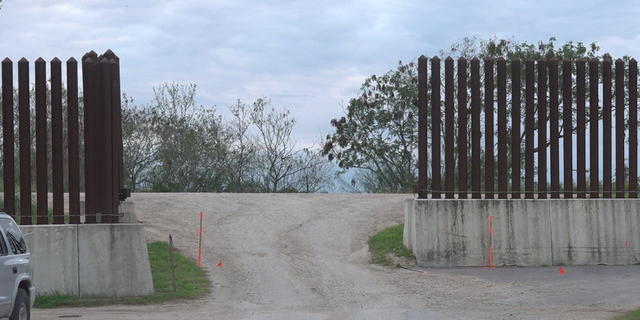 The cemetery sits beyond this section of border wall. Within months, a border wall gate will be built, and some say that could further discourage people from visiting the cemetery.