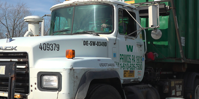 Trucks move through the weigh station at Waste Management's Fairless Landfill in Morrisville, Pennsylvania.