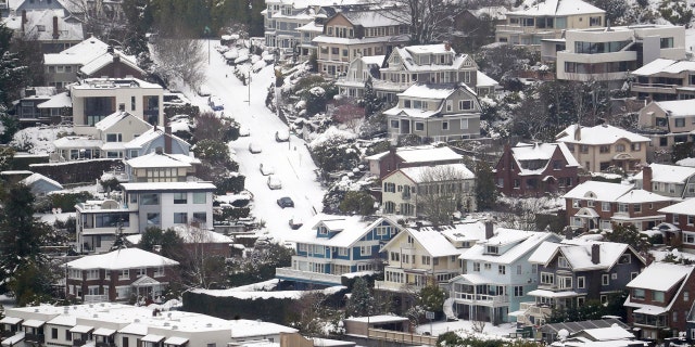 Schools and universities closed across Washington state and the Legislature canceled all hearings as the Northwest dealt with snow and ice and prepared for more as a series of winter storms socked the region.