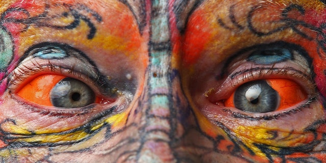 Authorities are considering banning eyeball tattoos in Washington state. (Getty)