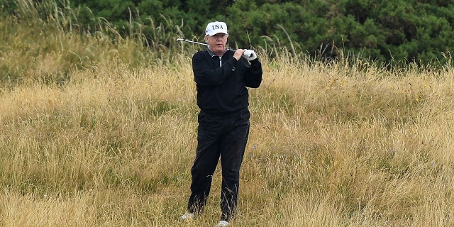 TURNBERRY, SCOTLAND - JULY 15: U.S. President Donald Trump plays a round of golf at Trump Turnberry Luxury Collection Resort during the U.S. President's first official visit to the United Kingdom on July 15, 2018 in Turnberry, Scotland. The President of the United States and First Lady, Melania Trump on their first official visit to the UK after yesterday's meetings with the Prime Minister and the Queen is in Scotland for private weekend stay at his Turnberry. (Photo by Leon Neal/Getty Images)