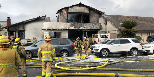 A small plane crashed in a residential California neighborhood on Sunday and set a single family home ablaze, officials said.