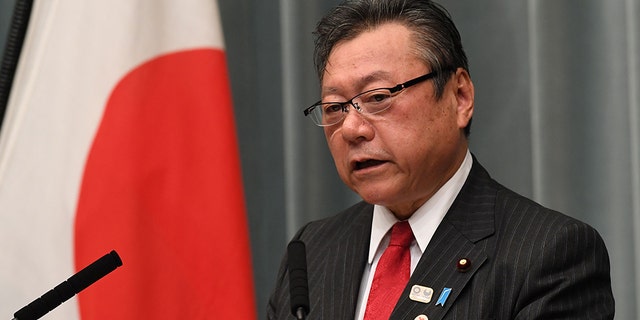 Japanese Olympic Minister Yoshitaka Sakurada has been forced to apologize after arriving three minutes late to a parliamentary meeting on Thursday