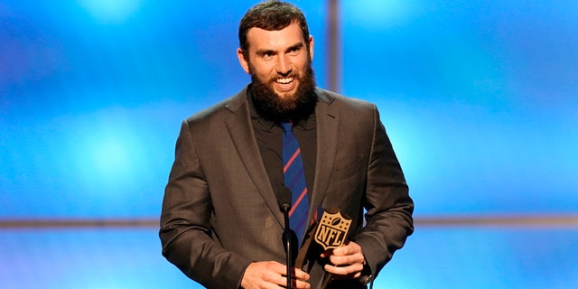 Andrew Luck of the Indianapolis Colts accepts the award for AP comeback player of the year. (Photo by Paul Abell/Invision for NFL/AP Images)