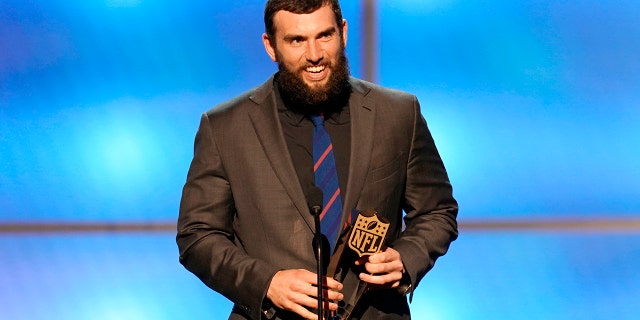 Andrew Luck of the Indianapolis Colts accepts the award for AP comeback player of the year. (Photo by Paul Abell/Invision for NFL/AP Images)
