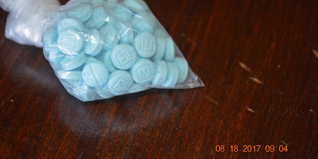 This undated photo provided by the U.S. Drug Enforcement Administration's Phoenix Division shows a closeup of the fentanyl-laced sky blue pills known on the street as "Mexican oxy." 