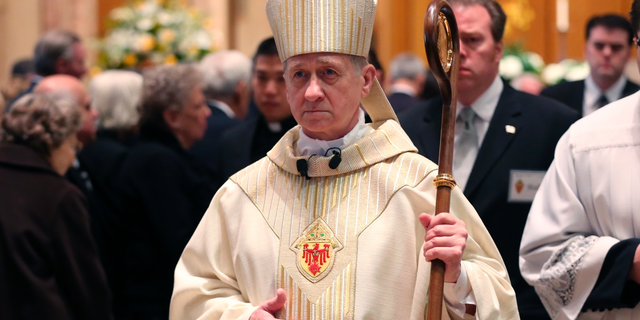 FILE - In this April 23, 2015 file photo, Chicago Archbishop Blase Cupich processes from Holy Name Cathedral following the funeral Mass of Cardinal Francis George in Chicago. The Chicago archbishop helping to organize next week's summit of the world's bishops at the Vatican says he expects it to make "significant progress" in responding to the sex abuse scandal that's riven the church. (Chris Walker/Chicago Tribune via AP, Pool, File)