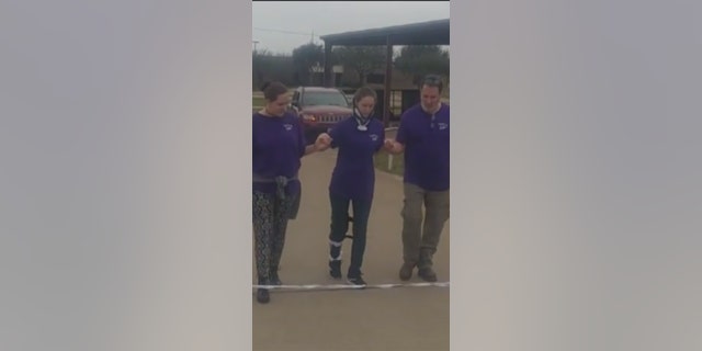 Bivins can now walk with assistance.