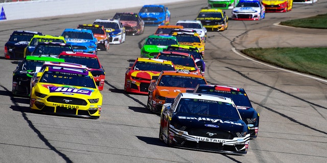 Keselowski shakes off flu to win at Atlanta