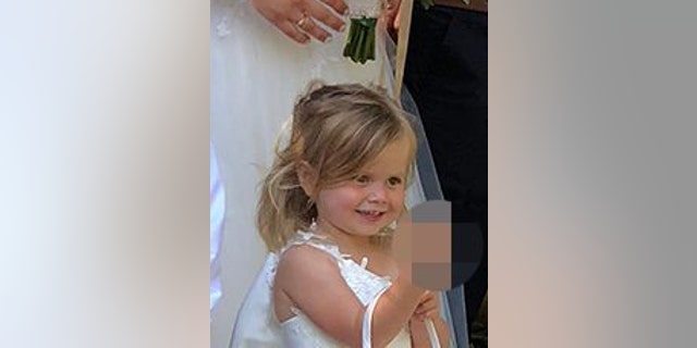 As the photographer snapped away, her youngest daughter Maddison, 3, decided it was the perfect time to show off the new trick she had learnt and popped her middle finger up to the camera making the snap truly unforgettable.