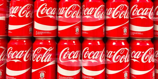Coca-Cola cans in rows