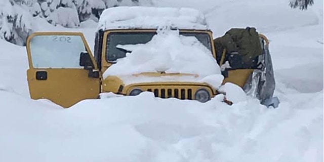 The Jeep got stuck in the snow at the Mendocino National Forest.
