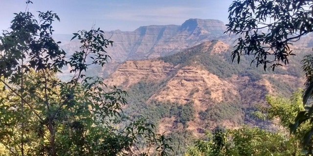 Layered lava flows into the Wai subgroup of near Ambenali Ghat, Western Ghats. (Credit: Courtney's Sprain)