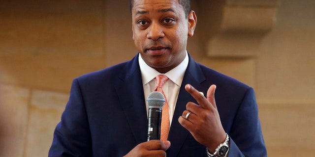 FILE- In this Sept. 25, 2018, file photo, Virginia Lt. Gov. Justin Fairfax gestures during remarks before a meeting of the Campaign to reduce evictions at a church meeting room in Richmond, Va. Two women have accused Fairfax of sexually assault. (AP Photo/Steve Helber)