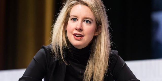 As her company was facing serious trouble, then-CEO of Theranos Elizabeth Holmes jetted off across the U.S. to purchase a Siberian husky she later claimed was a wolf, a report said.