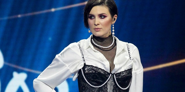 In this photo taken on Sunday, Feb. 24, 2019, Anna Korsun, who performs under the name of Maruv poses for a photo on stage at the national nomination for Eurovision in Kiev, Ukraine. Ukraine has pulled out of this year's Eurovision song contest following a politics-laden dispute between the singer who won the national competition and the country's national public broadcaster. (AP Photo/Vladimir Donsov, File)
