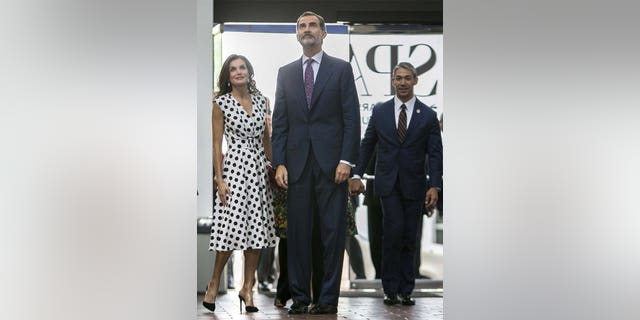 King Felipe the VI, center, and Queen Letizia of Spain arrive at the San Antonio Museum of Art, Monday, June 18, 2018, in San Antonio. San Antonio Mayor Ron Nirenberg, right, looks on.