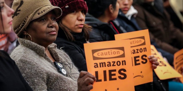 Protesters attend a New York City Council Finance Committee hearing titled 'Amazon HQ2 Stage 2: Does the Amazon Deal Deliver for New York City Residents?' at City Hall back in late January. (Photo by Drew Angerer/Getty Images)