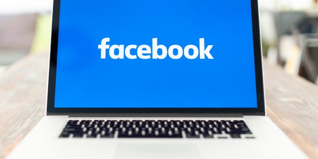 A laptop with a Facebook logo is seen in this photo illustration on October 15, 2018 in Warsaw, Poland. (Photo by Jaap Arriens/NurPhoto via Getty Images)