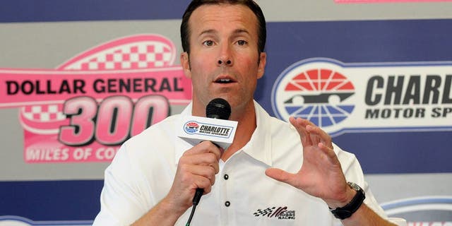 J.D. Gibbs, who died Jan. 11 at age 49, was president of Joe Gibbs Racing and the son of former NFL head coach Joe Gibbs. He is seen speaking at a news conference in Concord, N.C., Oct. 14, 2011. (Associated Press)