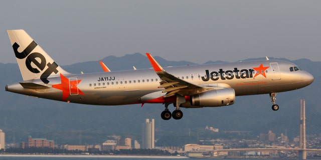 Following tradition, the bride walked down the aircraft’s aisle to meet her groom, with their vows officiated by a Jetstar employee.