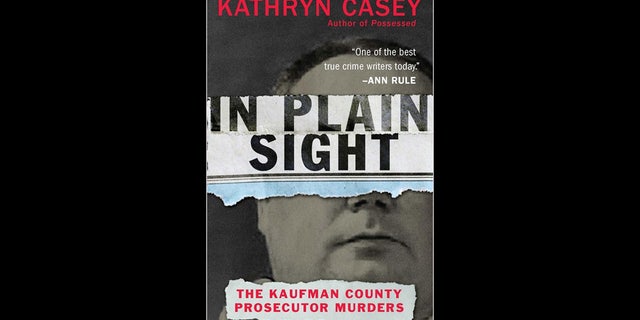 Kevin Alvarez, 19, appeared in a Bronx courtroom on Monday flashing the true-crime book "In Plain Sight: The Kaufman County Prosecutor Murders," which tells the story of a disgraced lawyer murdering two prosecutors who convicted him of theft