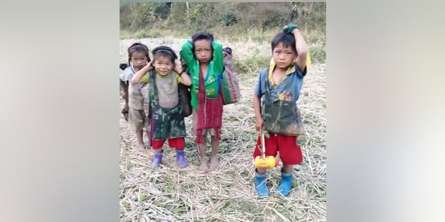 Karen children flee their homes in Burma on January 25, 2019