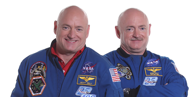 File photo - Scott Kelly (left) spent a year in space while his identical twin Mark (right) stayed on Earth as a control subject.