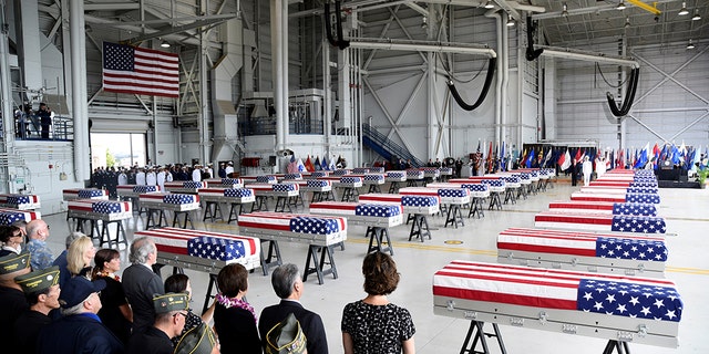 Caskets containing the remains of American servicemen from the Korean War handed over by North Korea arrive at Joint Base Pearl Harbor-Hickam in Honolulu, Hawaii, U.S., August 1, 2018. REUTERS/Hugh Gentry - RC1490AADB00