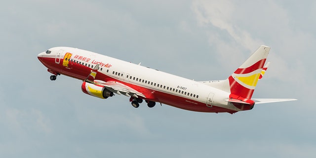 A 28-year-old man admitted to tossing the money at the plane's engine as he boarded the aircraft for flight 8L9960, as per the South China Morning Post.
