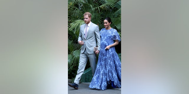 Britain's Prince Harry, left and Meghan, the Duchess of Sussex, leave the residence of Mohammed VI of Morocco, on the third day of their tour of Morocco, in Rabat, Monday, Feb. 25, 2019.