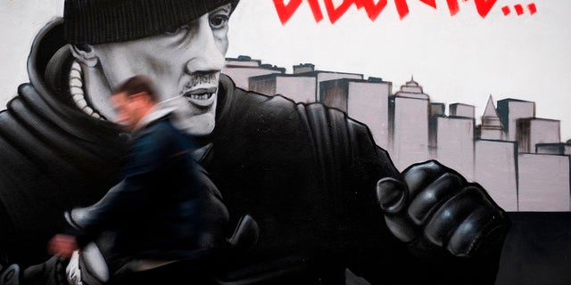 A mural of Christophe Dettinger, the former professional boxer turned "yellow vest" protester. He was given a one-year prison sentence on Wednesday night.