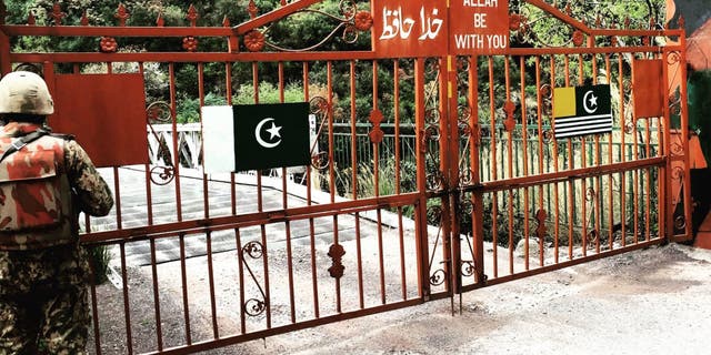 At the gates on the Pakistan side of the Indian border in Jammu and Kashmir, known as the "Line of Control" (LOC)