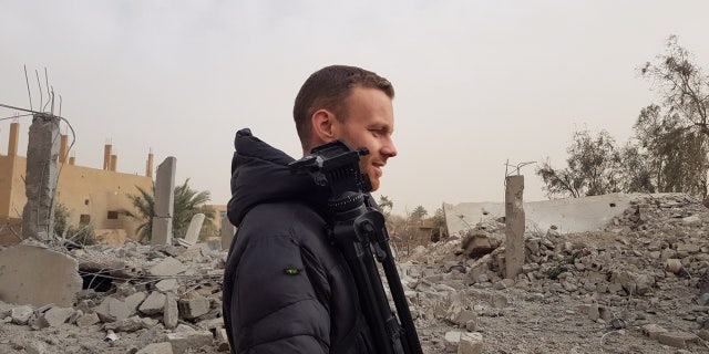 Thomas McClure, a 24-year-old native of the United Kingdom, is involved in research and getting the newly-minted “Rojava Information Center” off the ground.