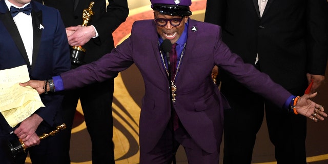 Charlie Wachtel, left, and Spike Lee accept the award for best adapted screenplay for "BlacKkKlansman" at the Oscars on Sunday, Feb. 24, 2019, at the Dolby Theatre in Los Angeles. (Photo by Chris Pizzello/Invision/AP)