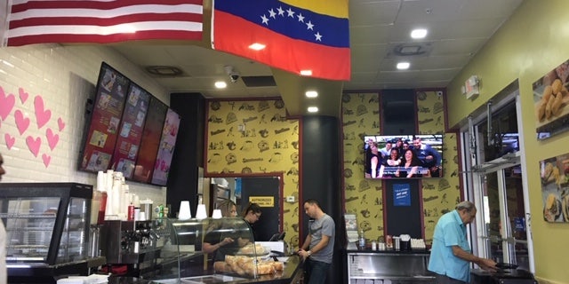 Molero owns the Super Arepa Doral in Doral, Florida. Venezuelan expats are now asking why demonstrators would protest Trump's speech Monday when the situation back home is in such disarray