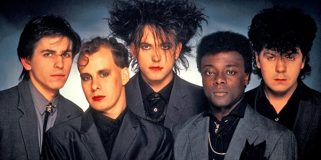 Phil Thornalley, Porl Thompson, Robert Smith, Andy Anderson and Lol Tolhurst of The Cure